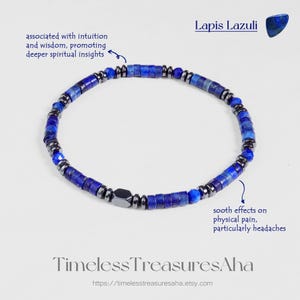 May include: A blue lapis lazuli bracelet with dark gray accents. The bracelet is made of small, square-cut beads and round beads. The text "Lapis Lazuli" is at the top. The text "Timeless Treasures Aha" is at the bottom.