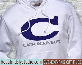 May include: White hoodie with a navy blue "C" and the word "COUGARS" in gray lettering.