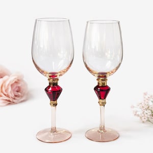 May include: A set of three ceramic mugs with a speckled, matte finish. The mugs are in shades of cream, light gray, and dark gray. Each mug has a simple, minimalist design, perfect for coffee or tea.