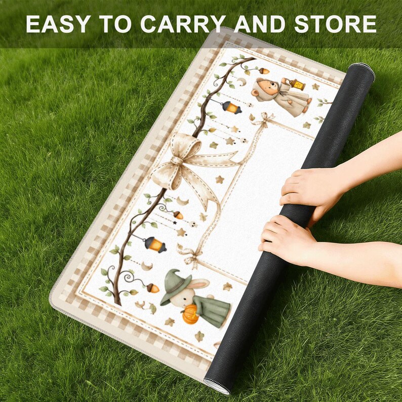 May include: A rectangular mat with a white center featuring a brown checkered border and illustrations of a bear in a hooded cloak and a rabbit in a green hat holding a pumpkin, accented by hanging lanterns, stars, and a large beige bow.