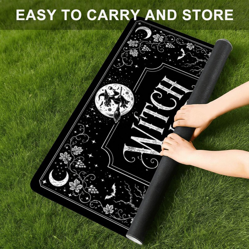 May include: Black rectangular mat with a witch-themed design, featuring a witch silhouette on a full moon, stars, and the word "WITCH". The mat is being rolled up, with the text "EASY TO CARRY AND STORE" at the top.