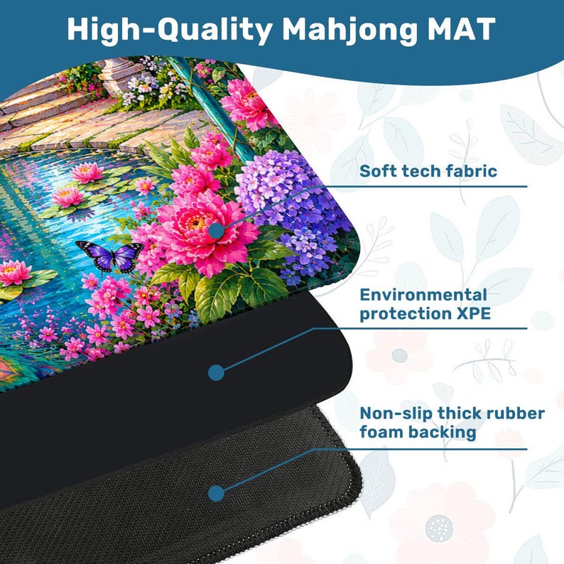 May include: A rectangular Mahjong mat featuring a colorful garden scene with pink flowers, purple hydrangeas, and a butterfly over a pond. The mat consists of three layers: a soft tech fabric top, an environmental protection XPE middle, and a non-slip thick rubber foam backing.