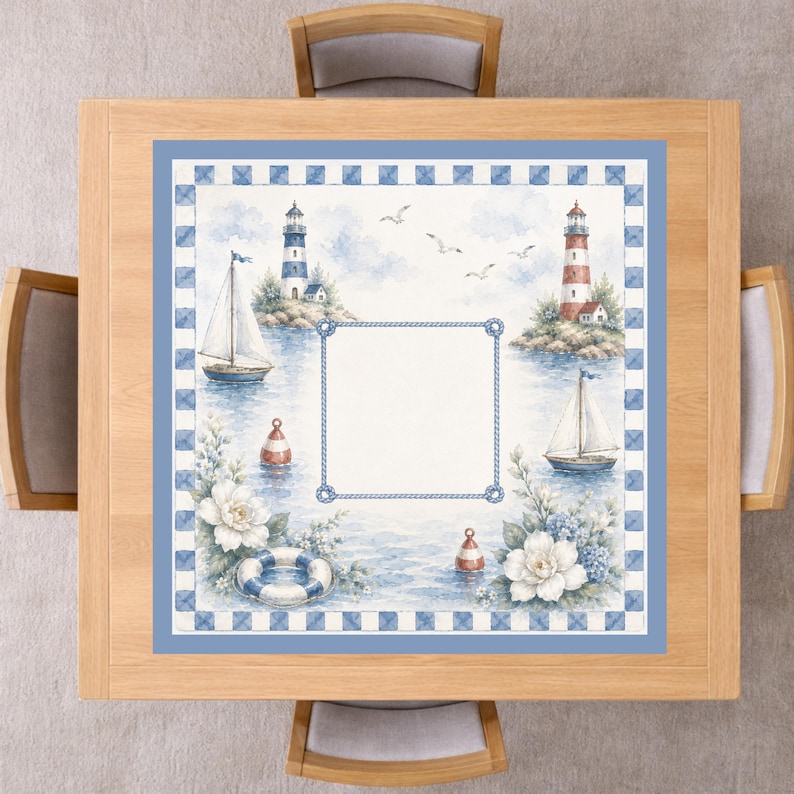 May include: A square tablecloth featuring a nautical theme with lighthouses, sailboats, lifebuoys, and white flowers. The design includes a central blank rectangular frame bordered by a rope pattern and a blue and white checkered outer border.