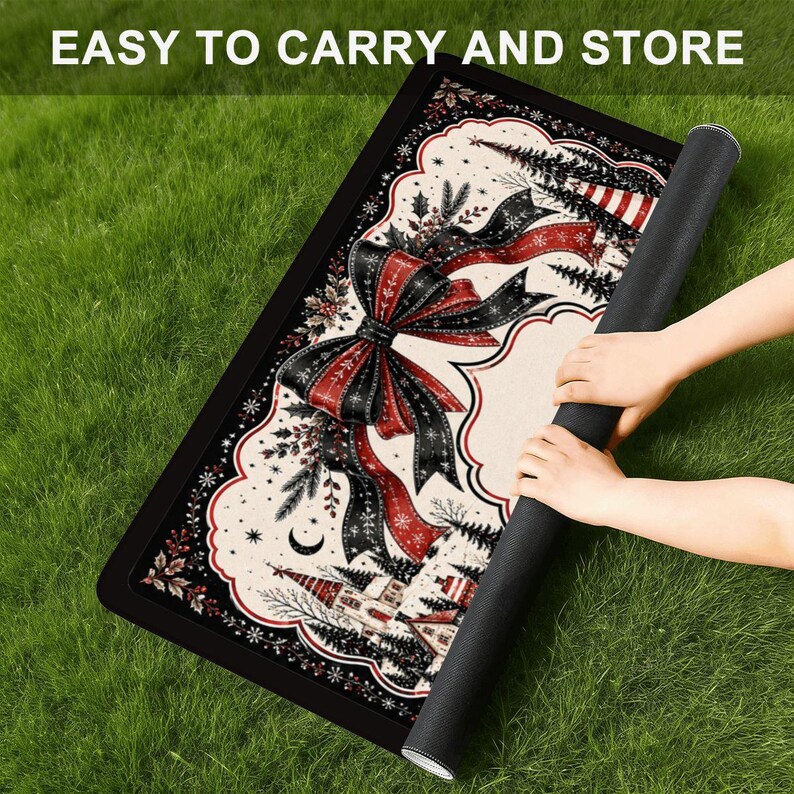May include: A rectangular floor mat featuring a festive holiday design with a large black and red bow, evergreen trees, holly, and a crescent moon on a cream background. The mat has a black border and the text EASY TO CARRY AND STORE at the top.