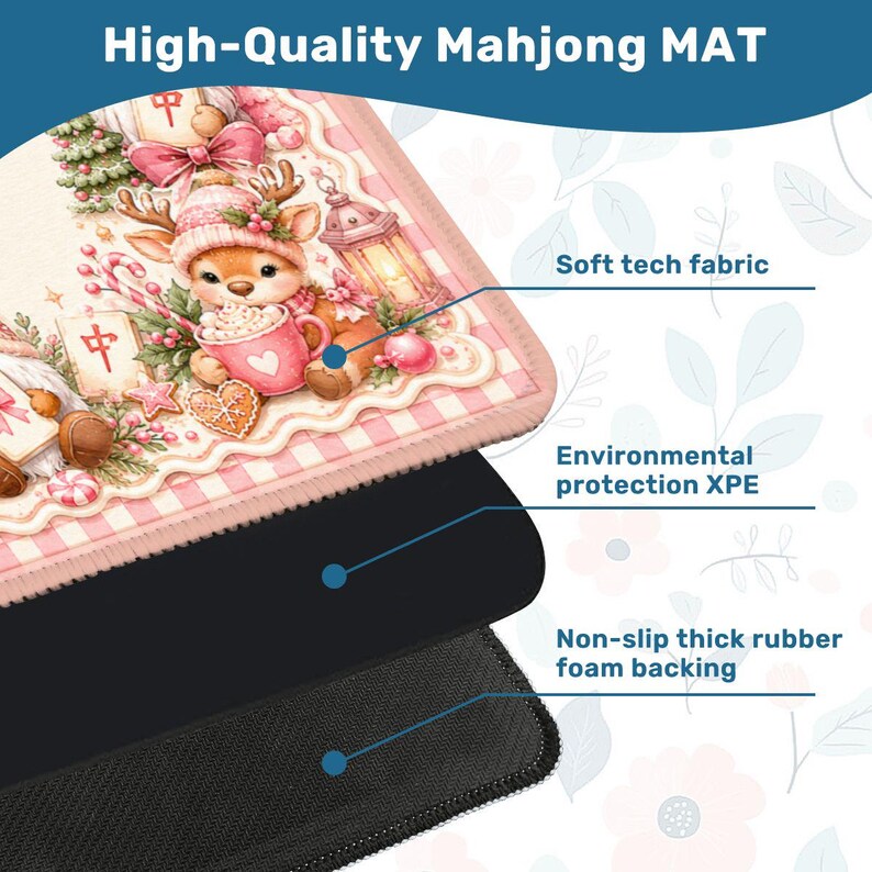 May include: A rectangular Mahjong mat featuring a Christmas-themed illustration of a fawn wearing a hat, holding a pink mug, and surrounded by holiday decorations. The mat includes a soft tech fabric top, an XPE layer, and a black rubber foam backing.