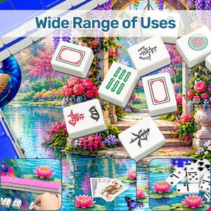 May include: A collection of white mahjong tiles with green, red, and black symbols scattered over a colorful garden scene featuring a pond, flowers, and a peacock. The text Wide Range of Uses is displayed at the top. Smaller panels show additional tiles, playing cards, and dominoes.