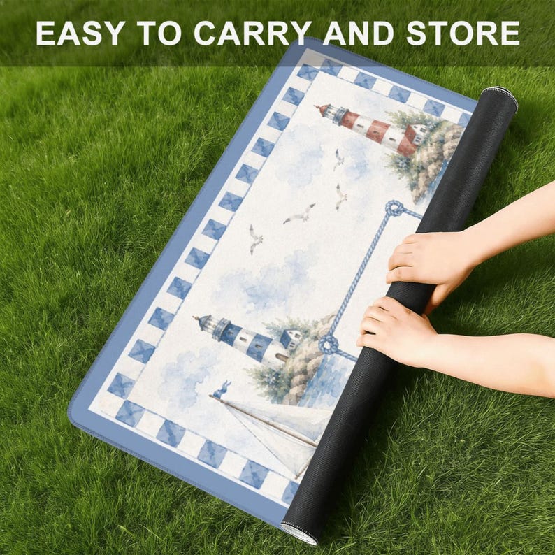 May include: A rectangular mat featuring a nautical theme with lighthouses, sailboats, and seagulls against a light blue sky. The border has a blue and white checkered pattern. The text EASY TO CARRY AND STORE is printed at the top of the image.