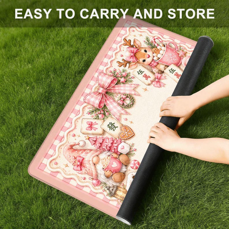 May include: A rectangular mat featuring a pink and white gingham border and a festive illustration of a reindeer and a gnome with holiday decorations, including bows, gifts, and gingerbread cookies. The text "EASY TO CARRY AND STORE" is visible.