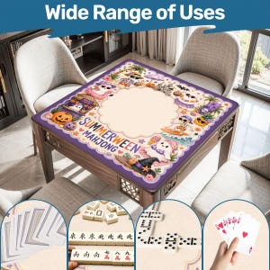 May include: A square mahjong mat with a purple border and a cream-colored center featuring Summerween Mahjong text and cartoon illustrations of ghosts, skeletons, and pumpkins. The mat is displayed on a table with circular insets showing playing cards, mahjong tiles, and dominoes.