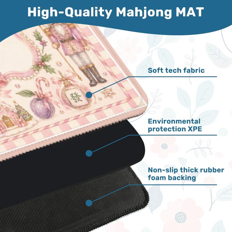 May include: A high-quality Mahjong mat with a pink and white design featuring a nutcracker and other holiday-themed illustrations. The mat has a soft tech fabric, environmental protection XPE, and a non-slip thick rubber foam backing.