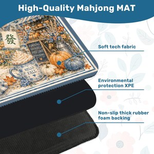 May include: Mahjong mat with a fall design, pumpkins, and a mug with "Hello Fall" text. The mat has the text "Pumpkins, Hayrides, Apple Cider, Mahjong". Features include soft tech fabric, environmental protection XPE, and a non-slip rubber foam backing.