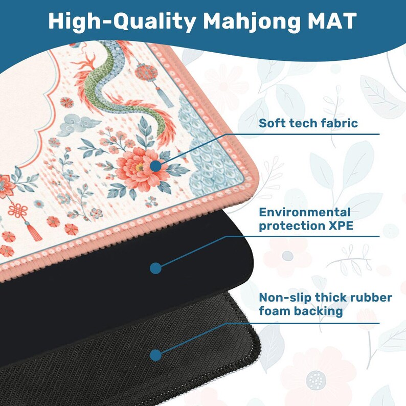 May include: A Mahjong mat featuring a cream-colored surface with a green dragon, pink floral patterns, and red tassels. The mat is composed of three layers: a soft tech fabric top, an environmental protection XPE middle, and a non-slip rubber foam backing.