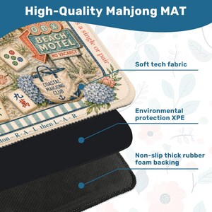 May include: A rectangular mahjong mat featuring a beach motel sign, mahjong tiles, and coastal floral graphics. The mat is composed of three layers: a soft tech fabric top, an environmental protection XPE middle layer, and a non-slip thick rubber foam backing.