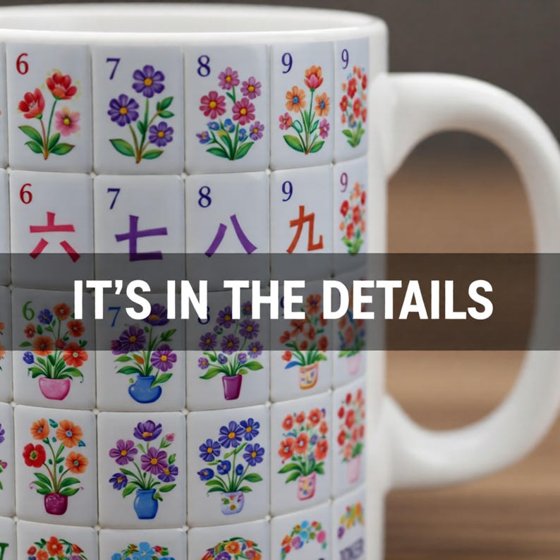 May include: White ceramic mug featuring a repeating pattern of floral tiles with the numbers 6, 7, 8, and 9, and Chinese characters. The text "IT'S IN THE DETAILS" is displayed across the center of the mug.
