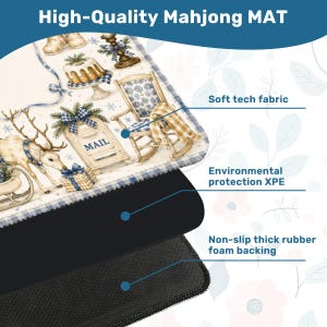 May include: A rectangular Mahjong mat featuring a festive winter scene with a reindeer, a mailbox labeled MAIL, a rocking chair, and a cake. The mat is constructed with a soft tech fabric top, an environmental protection XPE layer, and a non-slip thick rubber foam backing.