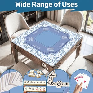 May include: A wooden game table with a blue and white patterned top. The table is surrounded by chairs. The table has the text "Wide Range of Uses" and game instructions. Various game pieces, including cards, dominoes, and mahjong tiles, are displayed.