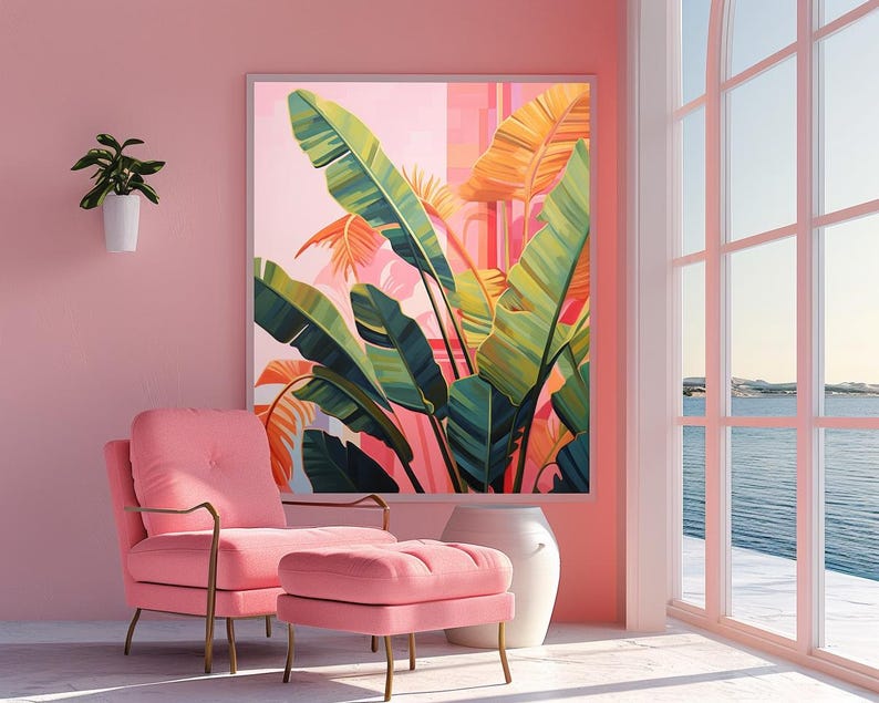 May include: A pink room with a large framed botanical print featuring green and yellow leaves. A pink armchair and ottoman sit in front of the print. A white vase and a small potted plant are also in the room. A large window overlooks the ocean.