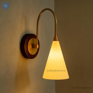 Enhance your decor with the Wall Articulated Mid Century Modern Solid Antique Brass Sputnik Stilnovo Light Fixture—stylish and functional