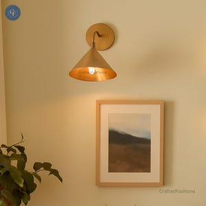 Illuminate your space with our Mid-Century Modern Wall Sconces, featuring raw brass Sputnik design inspired by Italian Stilnovo