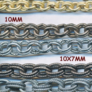 May include: Three rows of chain links in different sizes and finishes. The top row is labelled "7MM", the middle row is labelled "10MM", and the bottom row is labelled "10X7MM".