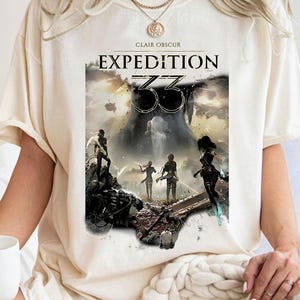 Clair Obscur Expedition 33 T-Shirt – Epic Fantasy Adventure Graphic Tee | Video Game Fan & Gamer Gift
