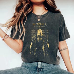 The Witcher Wild Hunt T-Shirt, Geralt of Rivia Graphic Tee, Dark Fantasy Gamer Shirt, RPG Gift for Him, Vintage Style Game Tee