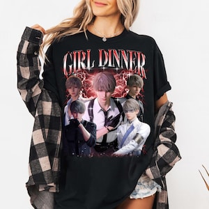 May include: Black t-shirt with a graphic print of five anime characters in a retro style. The text "GIRL DINNER" is printed in red and white above the characters.