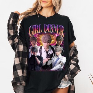 May include: Black t-shirt with a graphic print of five anime characters and the text "GIRL DINNER" in a retro style.
