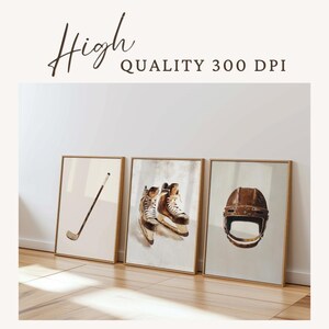 May include: Three framed prints of vintage hockey equipment. The prints are in a light brown frame and feature a hockey stick, a pair of hockey skates, and a hockey helmet.