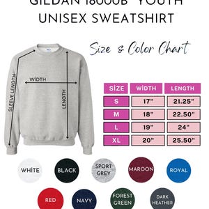 May include: A light grey Gildan 18000B youth unisex sweatshirt. The image includes a size and colour chart with measurements in inches. Available colours include white, black, sport grey, maroon, royal, red, navy, forest green, and dark heather.