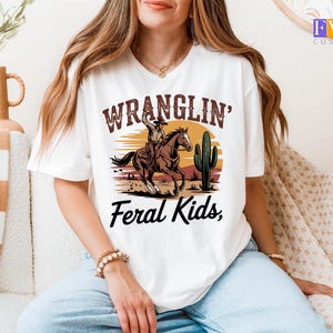 Wranglin Feral Kids T-Shirt, Funny Western Graphic Tee, Cowboy Riding Shirt, Vintage Desert Cactus Tee, Country Ranch Life Humor