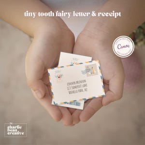 May include: A child's hands holding two small envelopes with a tooth fairy theme. The envelopes are blue and yellow with a cartoon tooth fairy on the front. The text on the envelope reads "CONNOR BRUNSON 123 SOMERSET LANE ROCHELLE PARK, NJ".