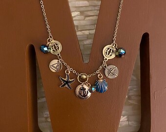 Seas the Day blue and gold nautical charm necklace