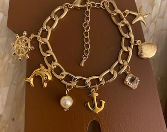 Nautical lover gold tone adjustable charm bracelet with 7 charms
