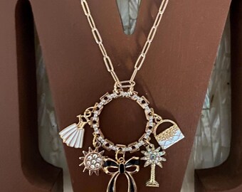 Vintage Gold Tone Charm Necklace: Bow, Beach, Shopping Charms