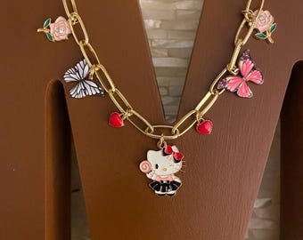 Hello Sweet Kitty inspired gold tone charm necklace with 7 enamel charms