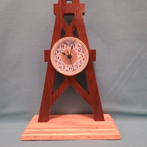 Handcrafted wooden desk or mantel clock cut to resemble an oil derrick