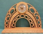 Unique arch type mantel clock cut from oak with a scroll saw
