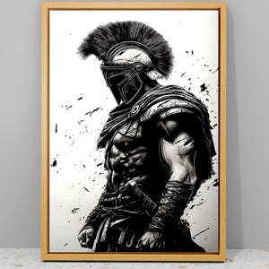May include: Framed black and white artwork of a Spartan warrior. The illustration shows a muscular figure in detailed armour, including a helmet with a crest. Splatter effects add a dynamic element to the image, enhancing the dramatic feel.