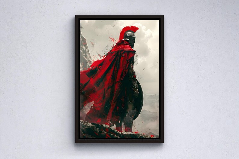 May include: A framed artwork depicts a warrior in a red cape and helmet, standing on a rocky outcrop. The artwork has a dramatic, painterly style with a focus on the figure's silhouette against a cloudy sky. The color palette is dominated by red, black, and gray.