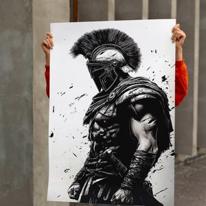 May include: Monochrome illustration of a Spartan warrior in full armour, including a helmet with a large plume. The artwork depicts a muscular physique and is set against a white background with black paint splatters.