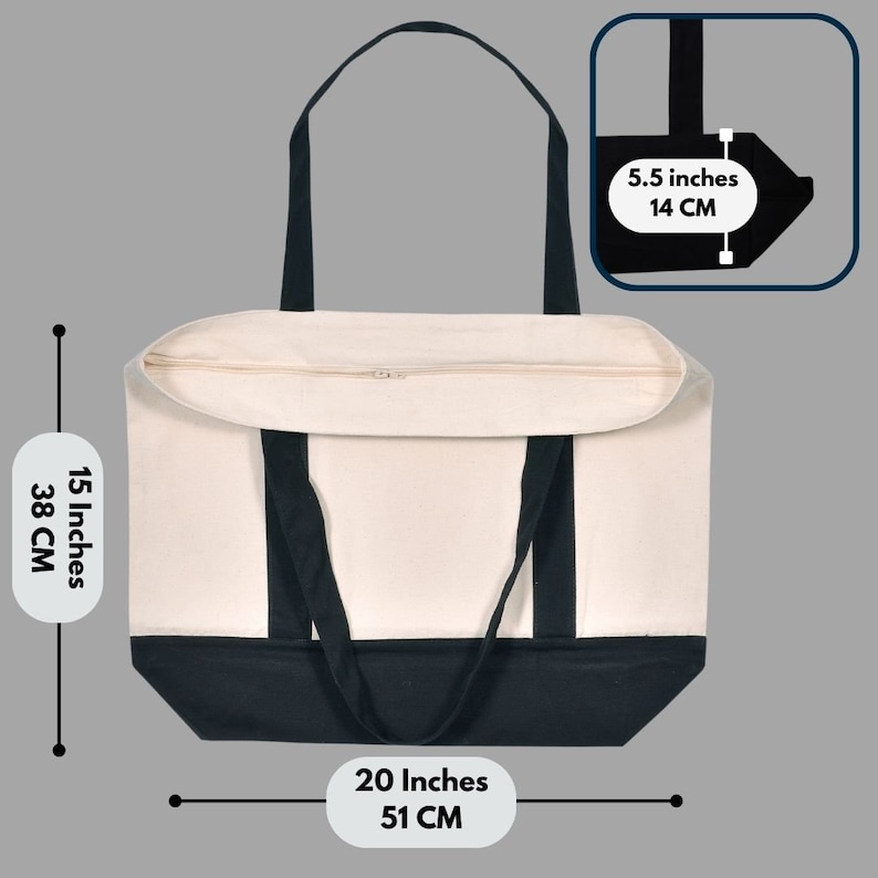 May include: A canvas tote bag with a cream-colored body and a black base and handles. The bag is 20 inches (51 cm) wide, 15 inches (38 cm) tall, and 5.5 inches (14 cm) deep. It has a zipper closure and is designed for carrying items.