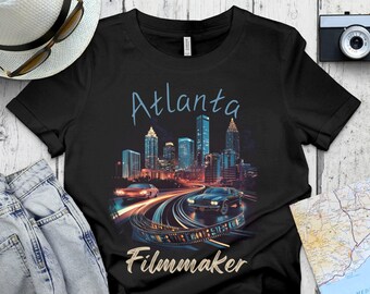 Filmmaker Atlanta maglietta troupe cinematografica maglietta produzione televisiva idea regalo per troupe cinematografica regalo per troupe televisiva produttore cinematografico bobina di pellicola maglietta unisex