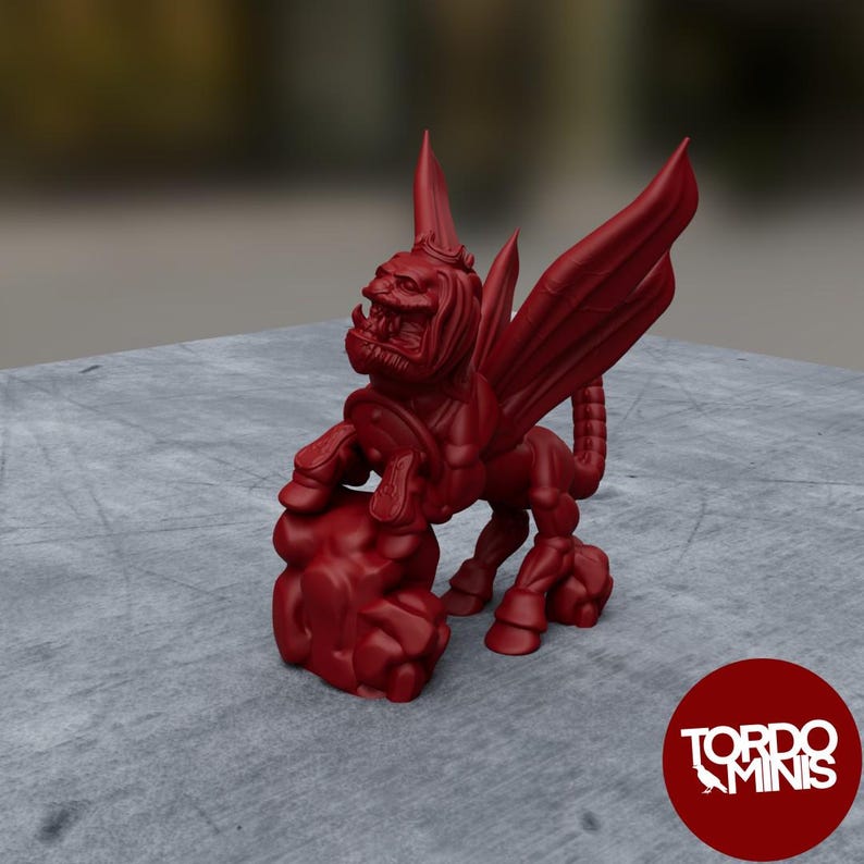 May include: A red winged lion figurine with a crown on its head. The lion is standing on a rock and has its wings spread out. The figurine is made of plastic and is about 5 inches tall.