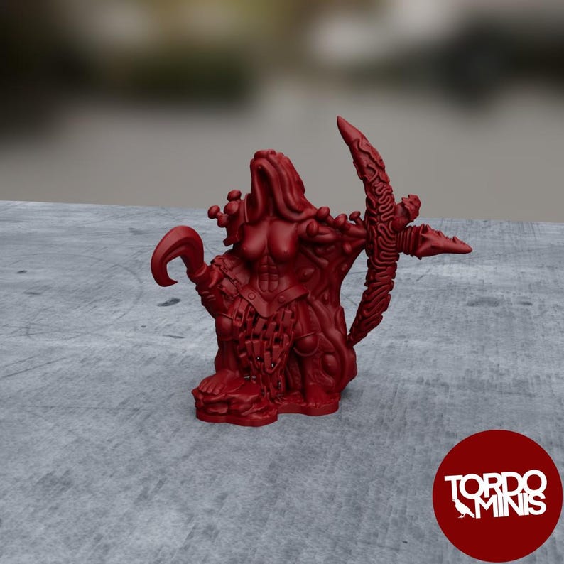 May include: A red 3D printed miniature of a female figure with a large, curved weapon. The figure is wearing armor and has a fierce expression.