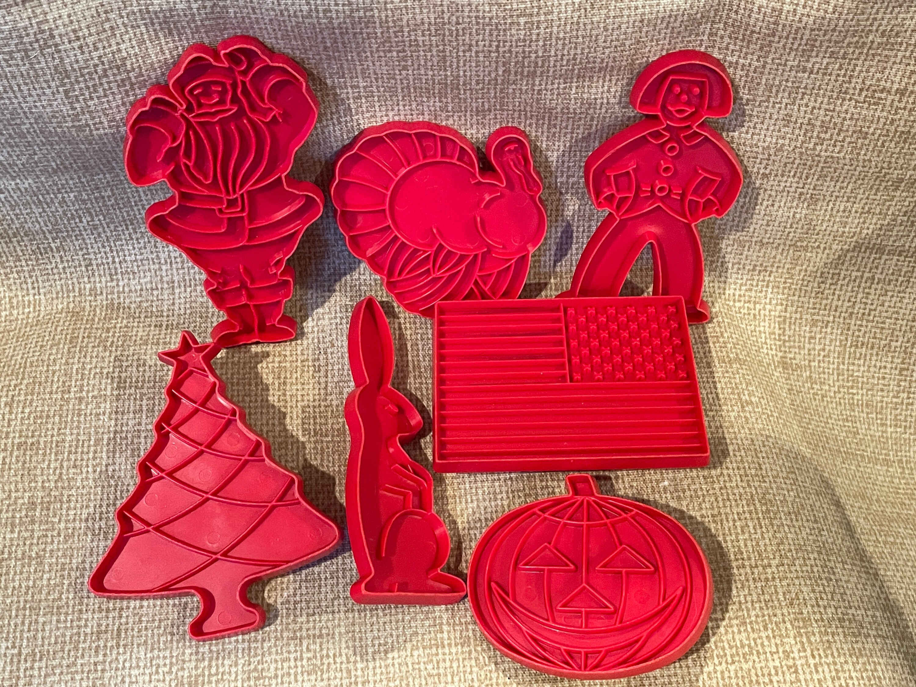 Tupperware red plastic holiday cookie cutters - vintage baking