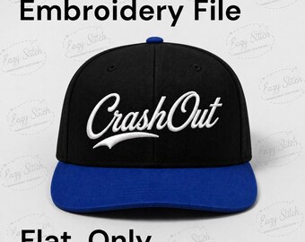 May include: Black and blue baseball cap with the text "Crash Out" in white script. The cap has a flat brim and a blue bill. The text "Embroidery File" and "Flat Only" are also visible.