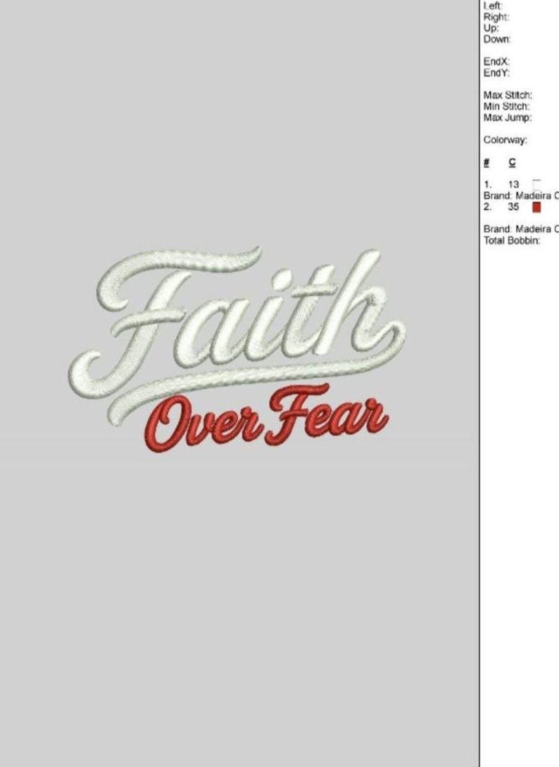 May include: An embroidered design featuring the words "Faith Over Fear." The word "Faith" is in white script, and "Over Fear" is in red script. The design is set against a light gray background.