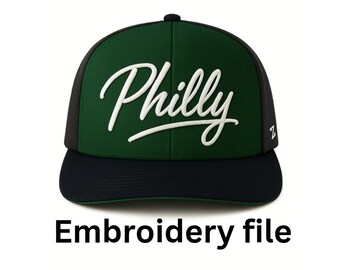 May include: A green and black baseball cap with the word "Philly" in white script across the front. The cap has a black brim and a mesh back. The text "Embroidery file" is below the cap.