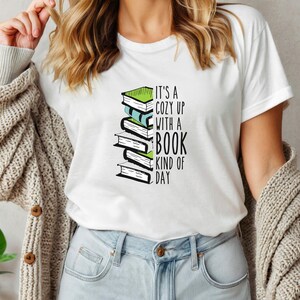 a woman wearing a t - shirt that reads it's a got up with